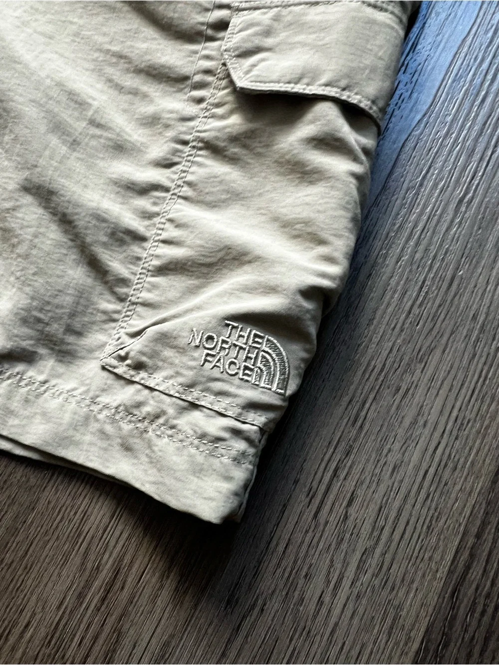 The North Face Men's Tan Cargo Shorts with Black Webbing Belt